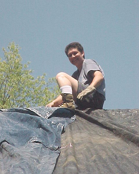 4/20/06-- Trish on Ridge Line (tarping of the roof)