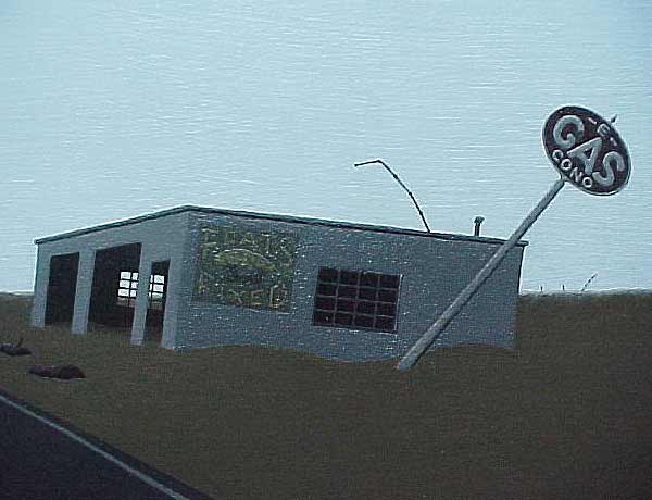 Closeup focusing on an abandoned gas station.